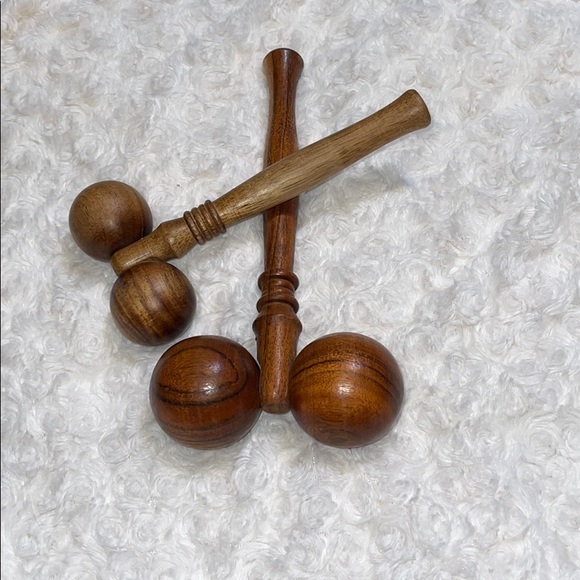 2 wooden massage rollers